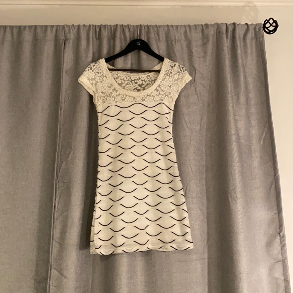White and black dress size small.